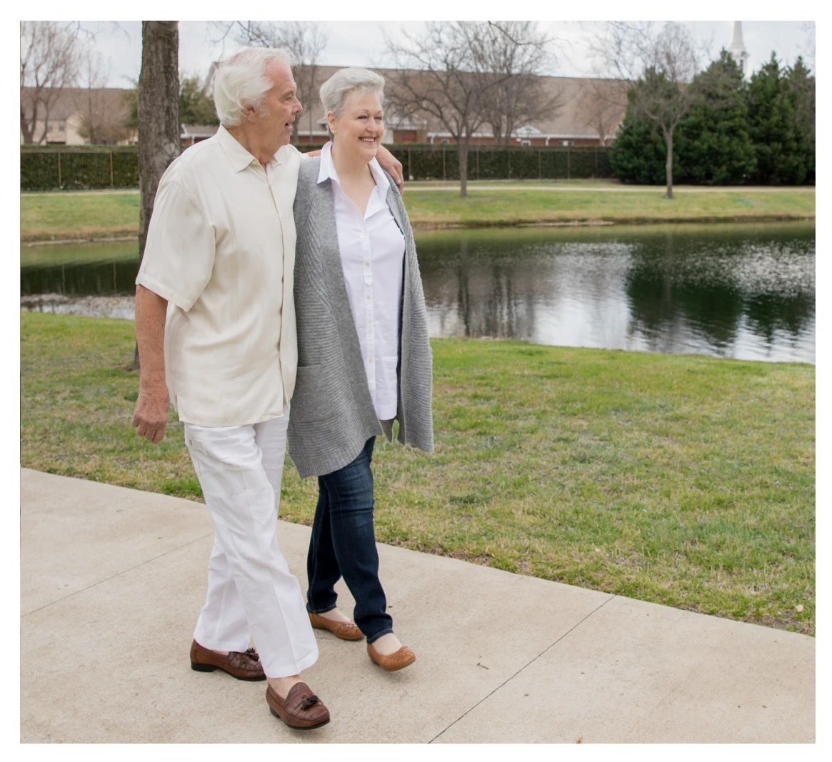 Happy couple walking together outdoors